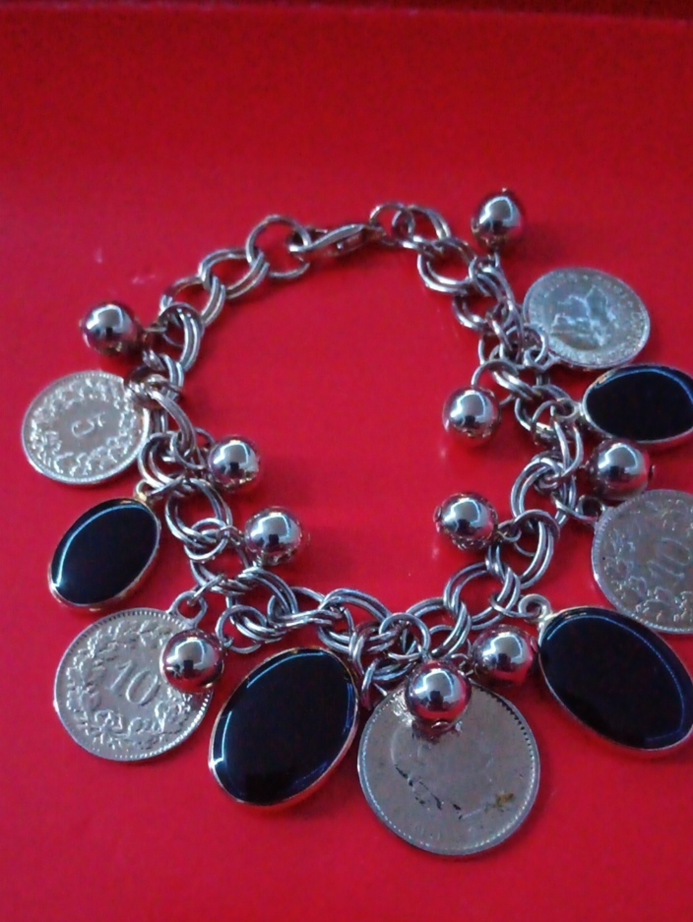 Silver Charm Bracelet with Black Stone Accents